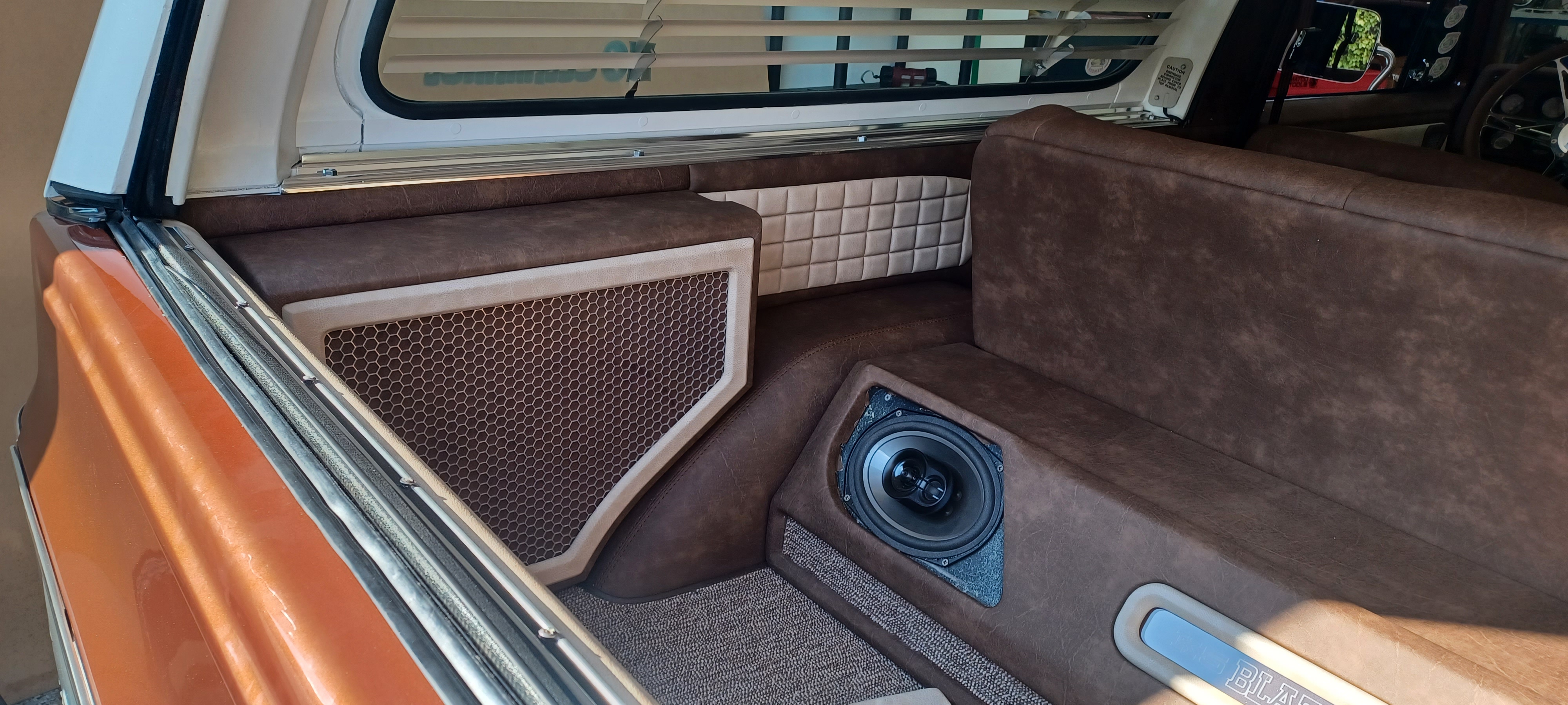 Custom automotive upholstery and diamond-stitch panels in a classic station wagon, Escondido
