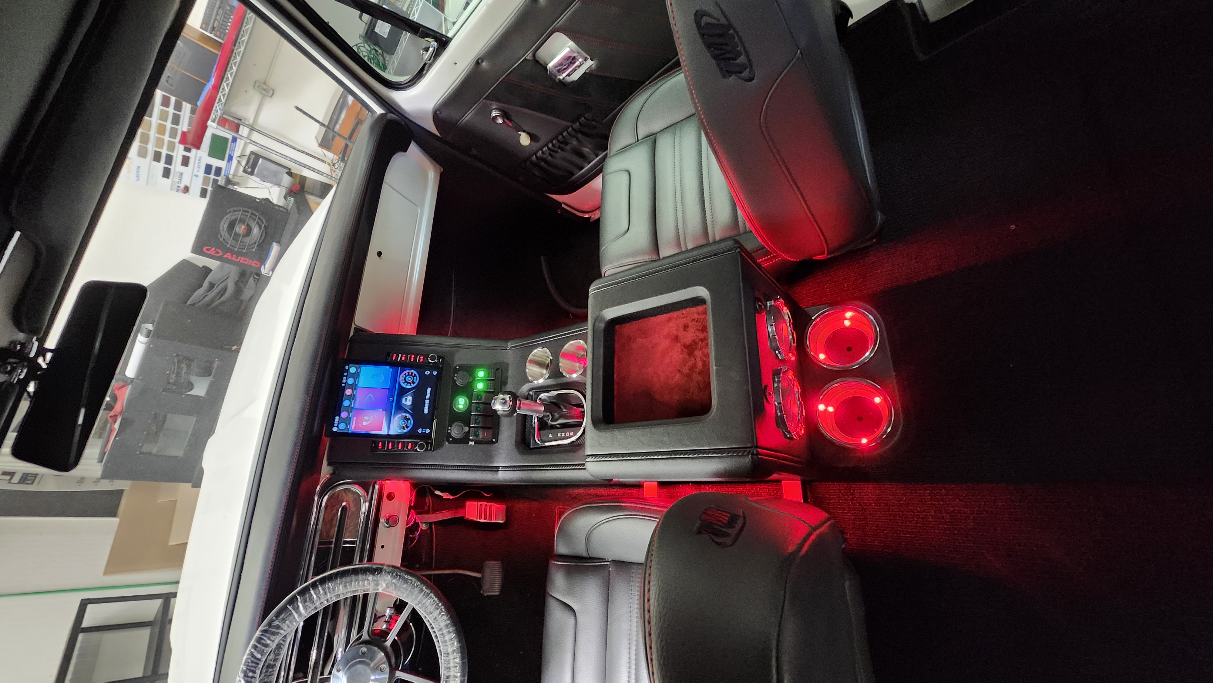 Custom lifted truck interior with ambient lighting and audio install, Escondido off-road build