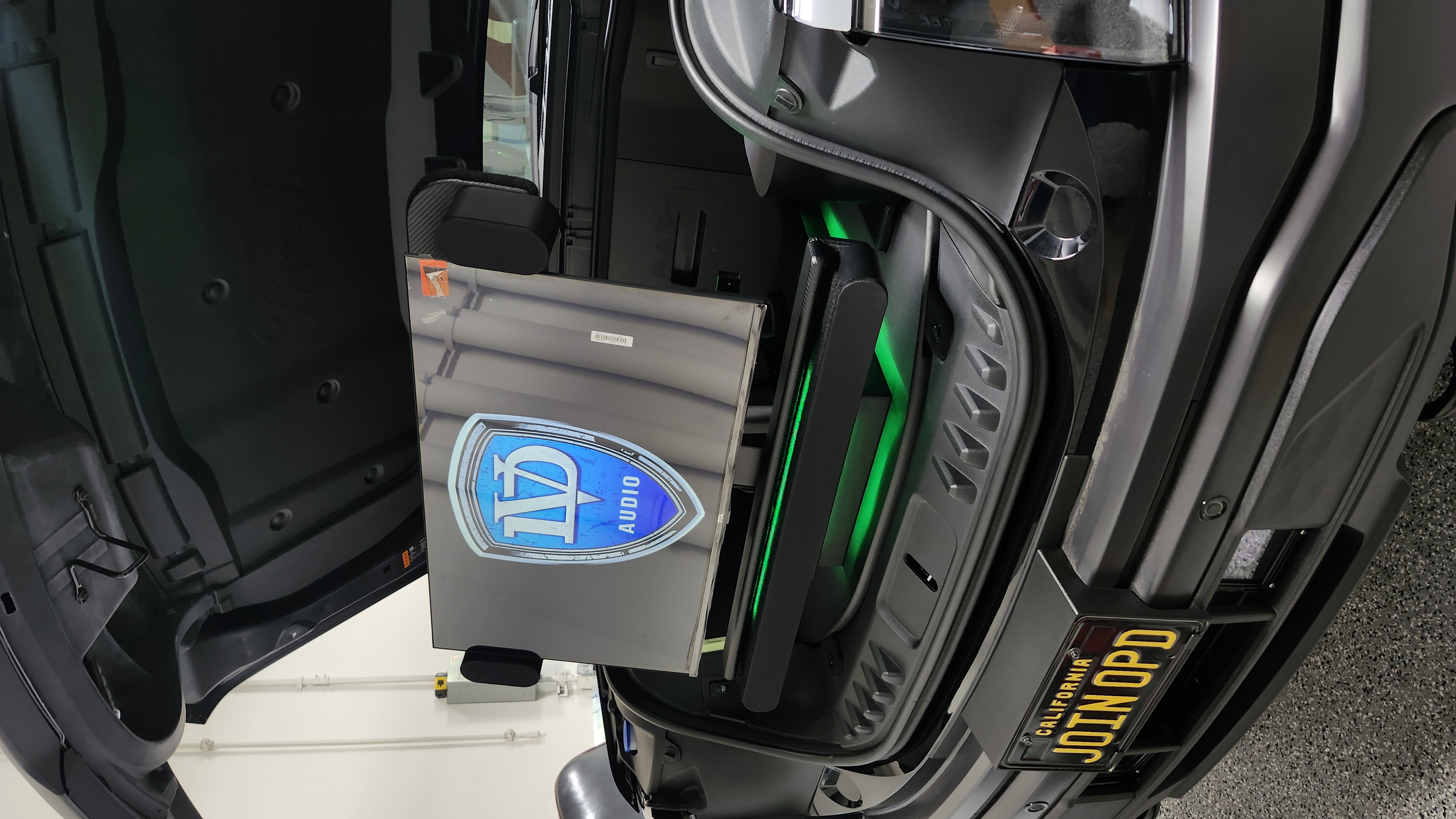 Custom subwoofer enclosure fabrication with DV Audio branded panel and LED lighting, Escondido car audio